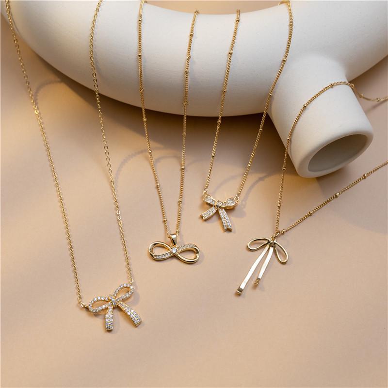 18K Gold Zircon Copper Bow Necklace with Full Diamond Clavicle Chain