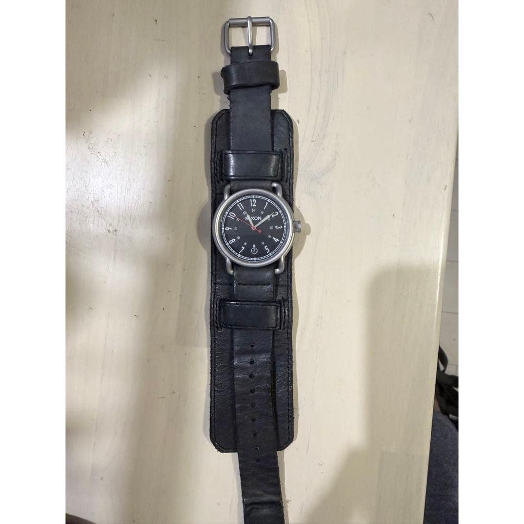 Used NIXON watch with leather band extremely rare