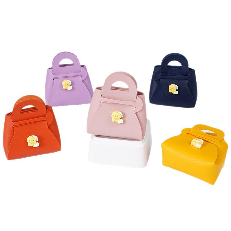 Cartoon Gelbe Enten-Greifautomaten-Schlüsselanhänger Macaron-Anhänger Münzbeutel Tasche