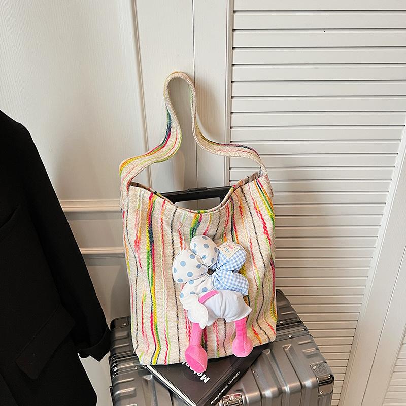 

Korean rainbow striped canvas bag 2025 autumn new fashion simple sweet underarm bag large capacity handbag рожевий