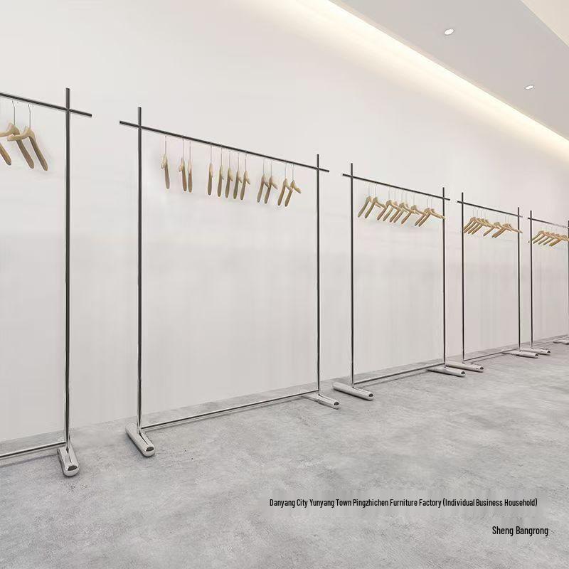 Clothing Store Display Rack: Stainless Steel Minimalist Floor-Standing Rack for Men's, Women's, and Children's Apparel.