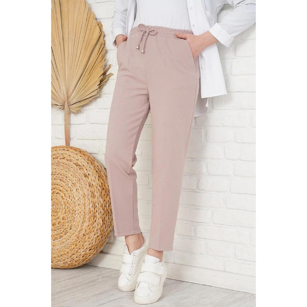 Pantaloni a carota elastici da donna