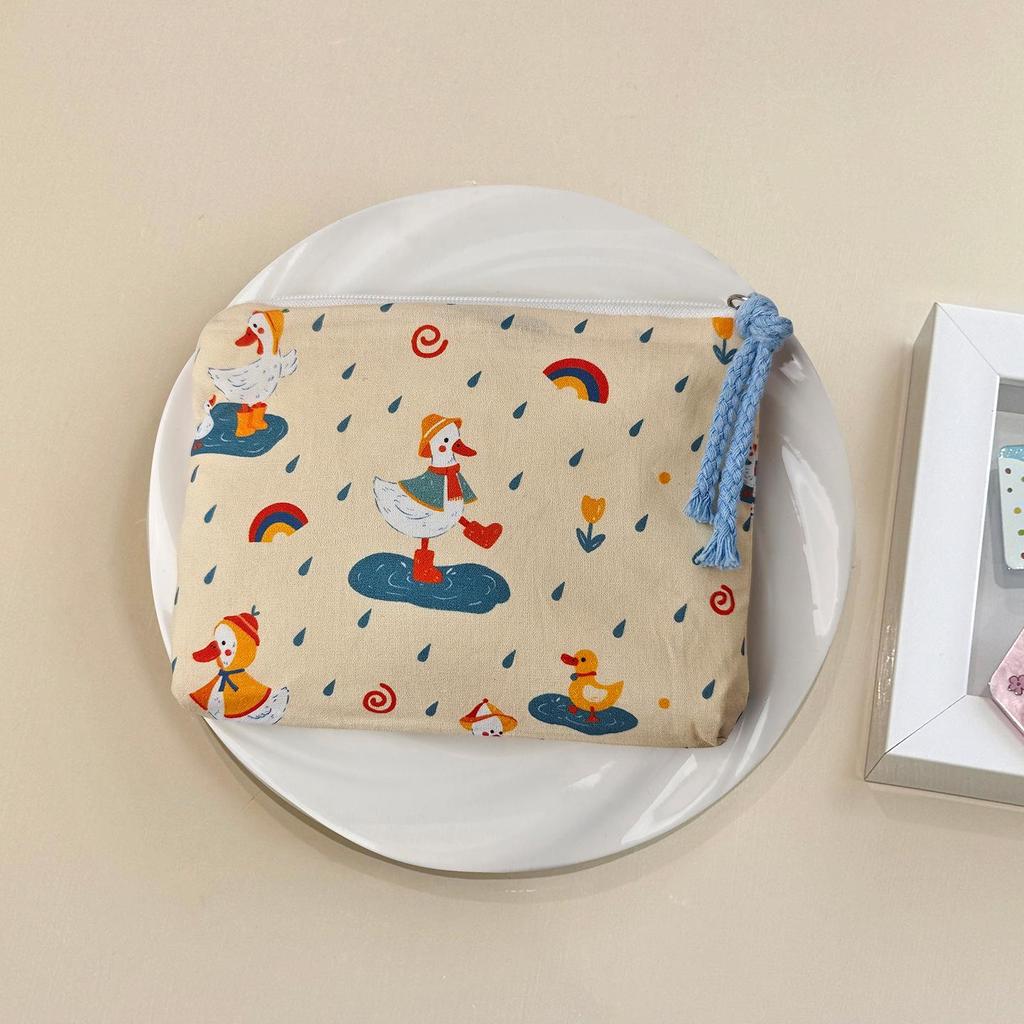 Adorable Blue Cartoon Makeup Bag: Mini Pure Cotton Coin and Earphone Pouch, Lipstick Carrier, Portable Storage.