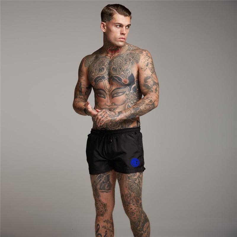 Muscleguys Summer Fitness Gyms Shorts Muscle guys Breathable Comfortable Shorts Men Workout Running Short Pants Sportwear Shorts