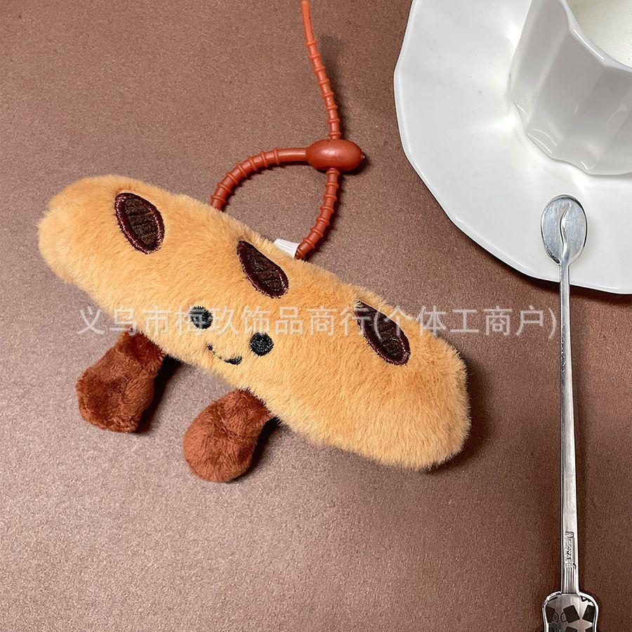 New Cute French Baguette Stuffed Bun Doll Squeaks Croissant Doll Key Chain Pendant Bag Pendant.