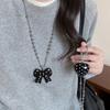 Stylish Long Beaded Necklace Featuring Black Round Dots And Bowknot Love Charm For Casual or Party Wear