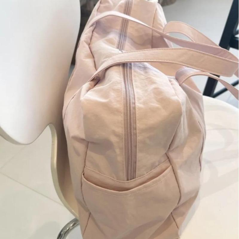 Pink casual large-capacity bag for women, new fashionable commuting simple niche design travel fitness bag