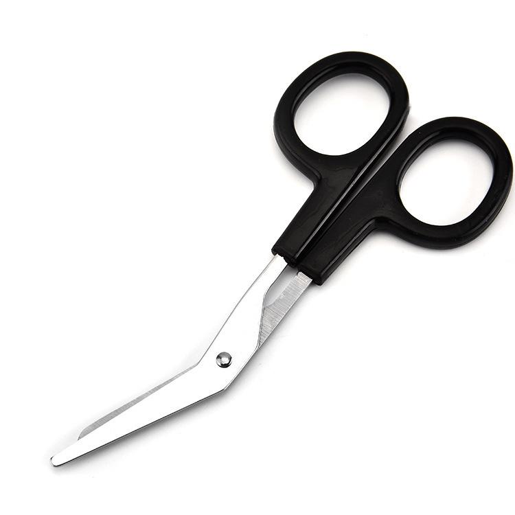 Kinesiologie-Tape und Verbandschere aus Edelstahl