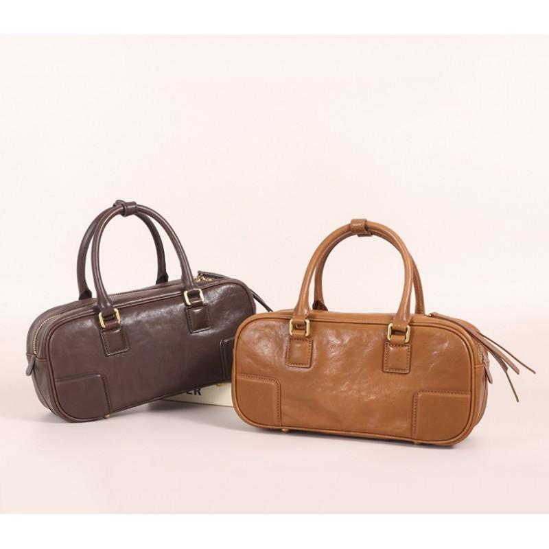New Vegetable Tanned Leather Pillow Bag Women's Retro Niche Handbag Fashionable High-end Commuter Portable Boston