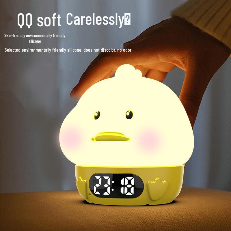 Duck Silicone Alarm Clock with Night Light and Cartoon Tap Feature