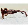 Used COACH sunglasses, brown, signature pattern, pink, rose-toned