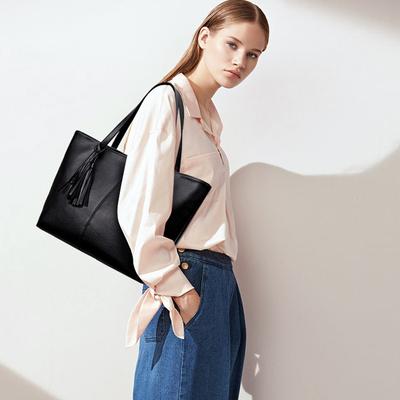 Damen Handtaschen mit großem Fassungsvermögen Damen Retro Quasten Design Tote Luxusmarke PU Leder Umhängetasche Damen Oberer Griff
