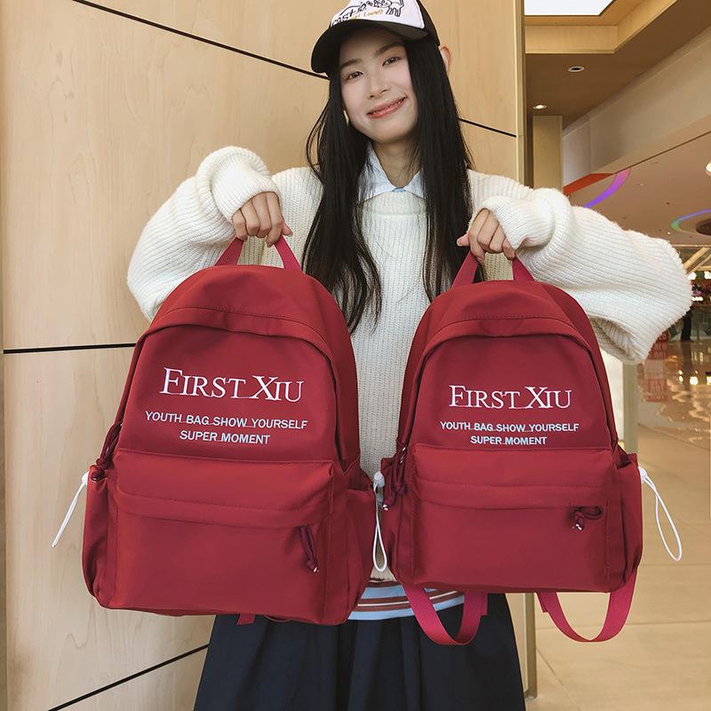 School bag Korean version ins style versatile junior high school student school bag solid color letter backpack high value simple lightweight backpack