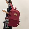 Neuer Rucksack weiblich Mittelschule College-Student Schultasche einfarbig beliebt Rucksack mit großem Fassungsvermögen einfacher modischer Stil