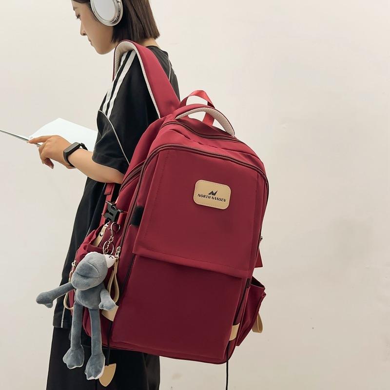 Neuer Rucksack weiblich Mittelschule College-Student Schultasche einfarbig beliebt Rucksack mit großem Fassungsvermögen einfacher modischer Stil