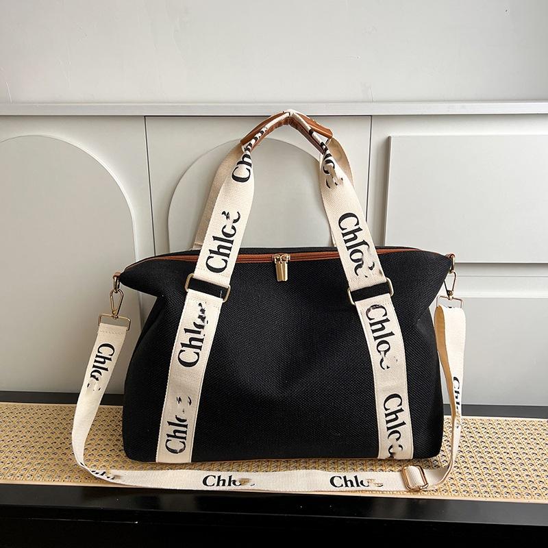 Spring new largecapacity women s bags, commuting versatile tote bags, highend messenger niche design shoulder bags 44*33*18 чёрный