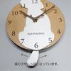 Stylish wooden pendulum clock featuring a toy poodle in white and cream. Silent, perfect for bedrooms, bedrooms, or any room.