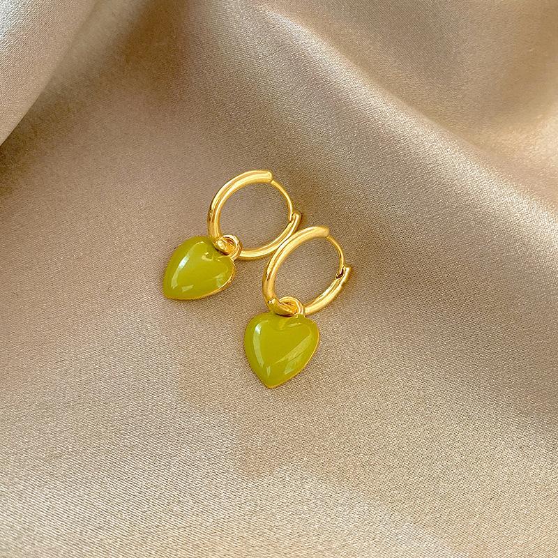 

Серьги-пряжки Simple Temperament White с тремя размерами в виде персикового сердца и холодного ветра