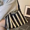 Large Capacity Underarm Tote Bag 2025 Summer New Striped Woven Women's Fashion Versatile Hollow Shoulder Messenger Bag