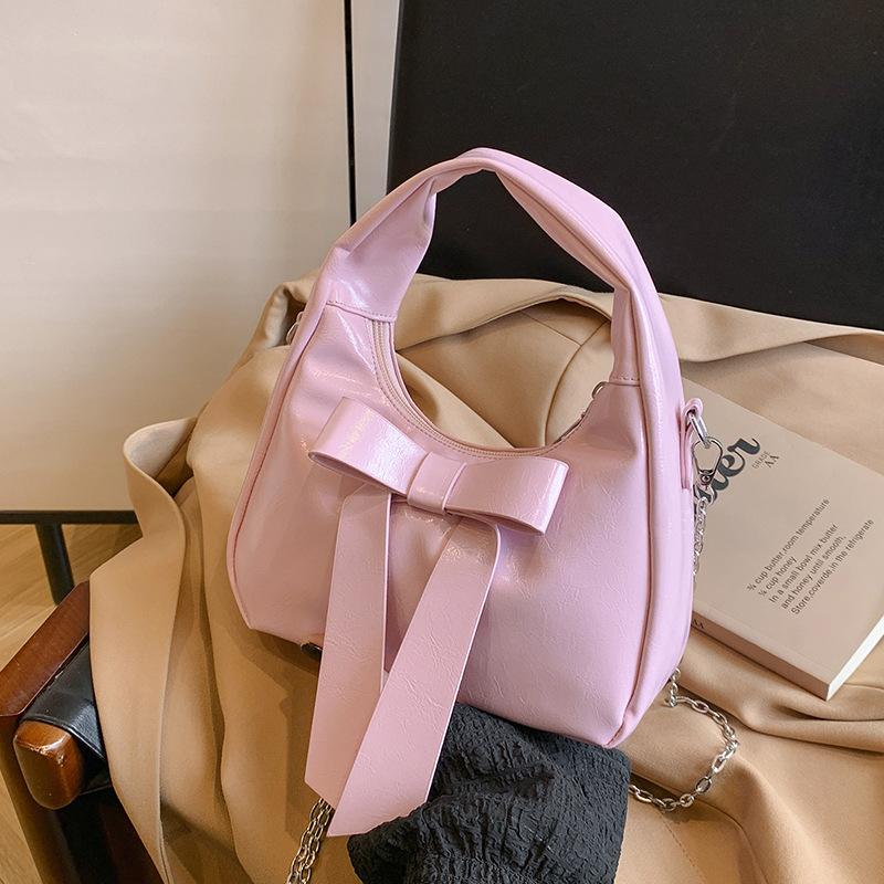 

Niche design bag women s spring and summer 2025 new fashion bow chain messenger bag women s portable dumpling bag розовый