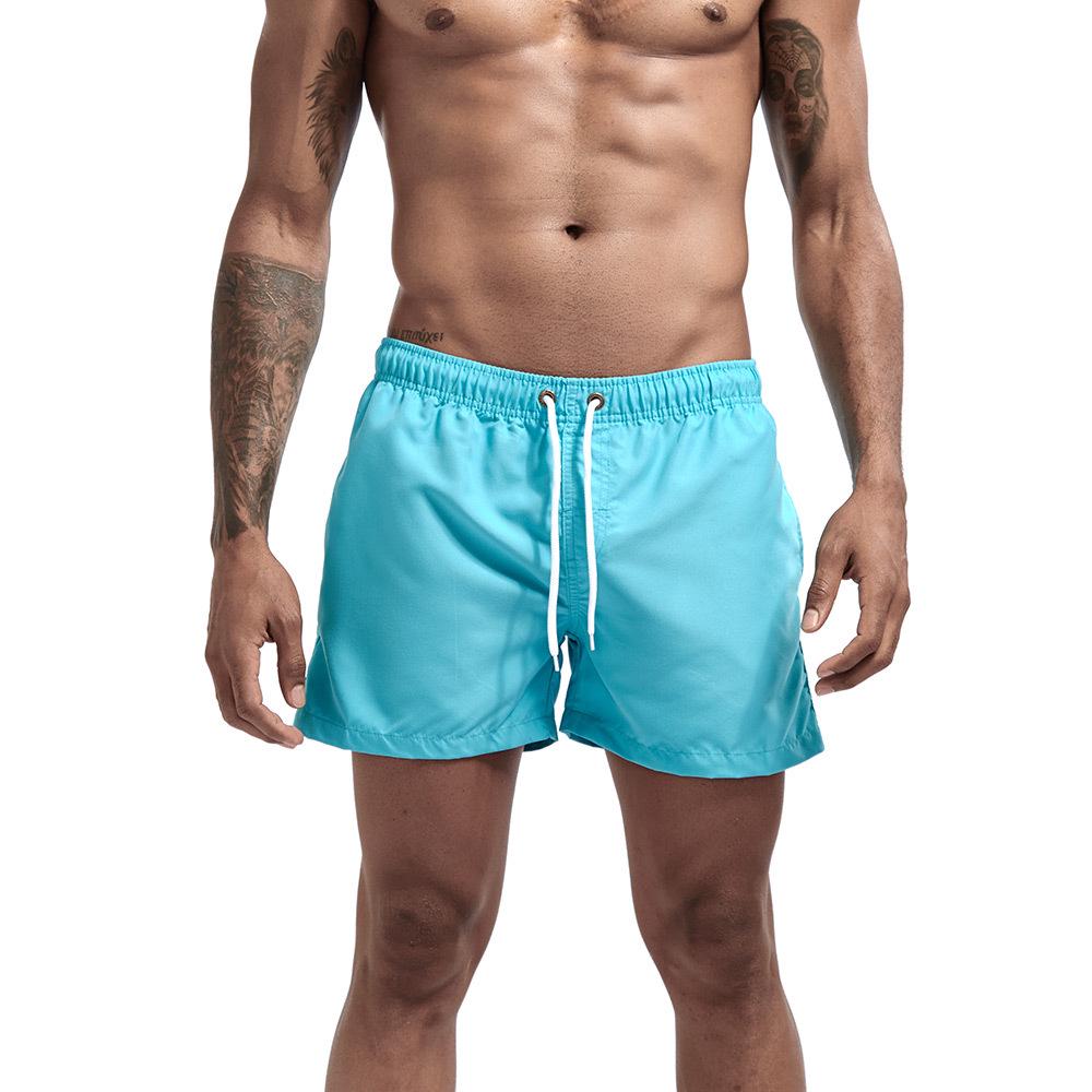 

Men s Multi-Color Solid Three-Point Beach Shorts - Fashion Straight-Leg Loose Sportswear. XXL