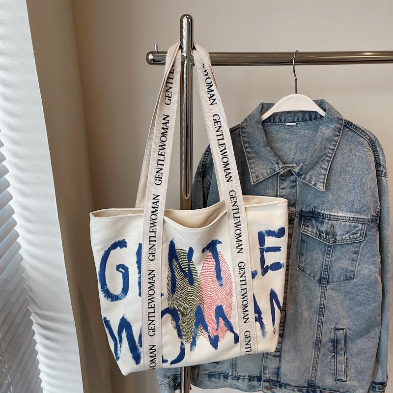 Canvas bag women's 2025 new shoulder bag casual large-capacity Korean version student schoolbag literary and leisure handbag bag