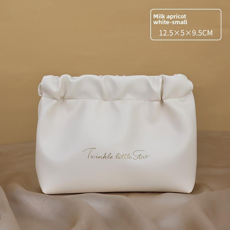 

Тришарова дорожня косметичка високої якості з поліуретану на подвійній блискавці small