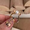 Medieval Diamond-Studded Pearl Earrings and Peace Love Crown Stacking Ring with Advanced Brushed Design
