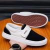 Fashion breathable versatile black and white color matching one-pedal Velcro low-top men's shoes student canvas board shoes