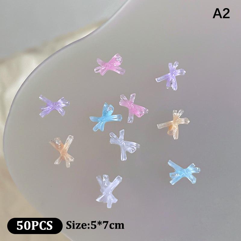 50Pcs Ice Transparent Color Bowknots Resin Nail Art Decorations 3D Mini Cute Bows Nail Charms For Diy Nails Accessories