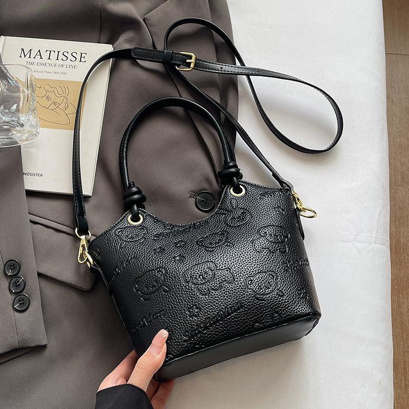 2025 new casual niche cute print high-end portable bucket bag fashionable women's commuter style messenger bag