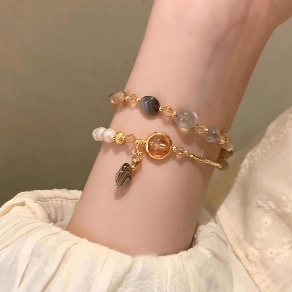 An Elegant Bohemian-Style Bracelet, Paired with a Synthetic December Birthstone for Women - a Trendy