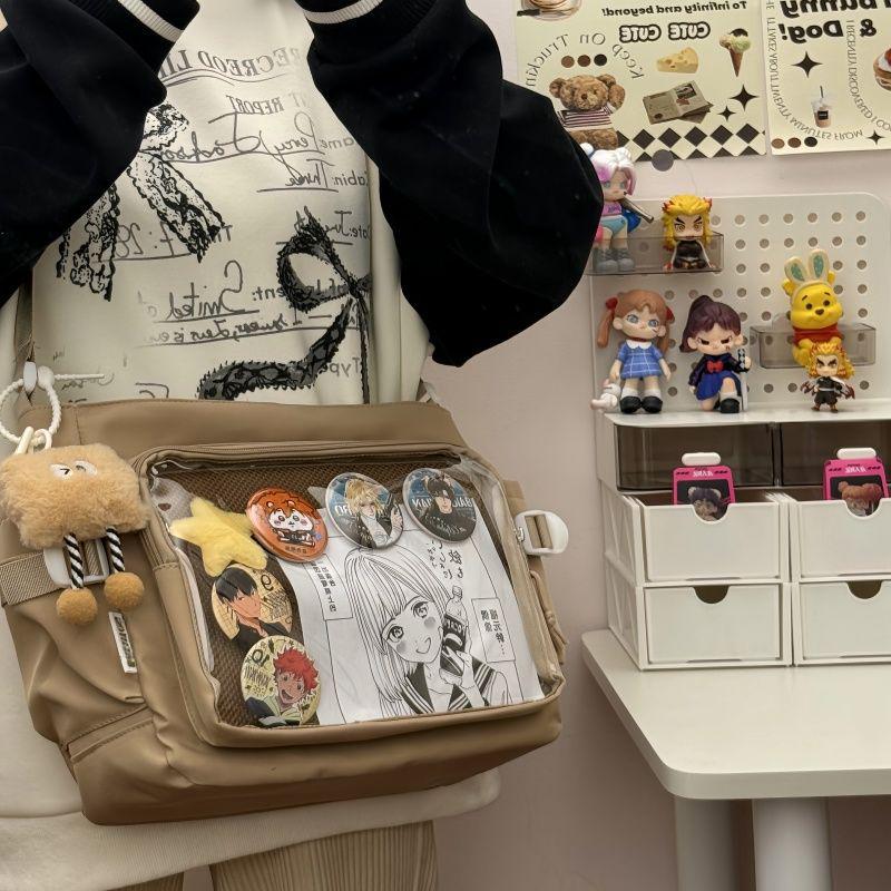 2025 College Style Dámská messenger taška s velkou kapacitou - Průhledný odznak s knoflíkem Ita Bag