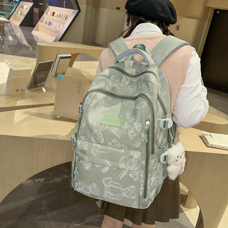 Schoolbag schoolbag female college student printed bear backpack 1011 new versatile primary school middle and high school class large capacity bag