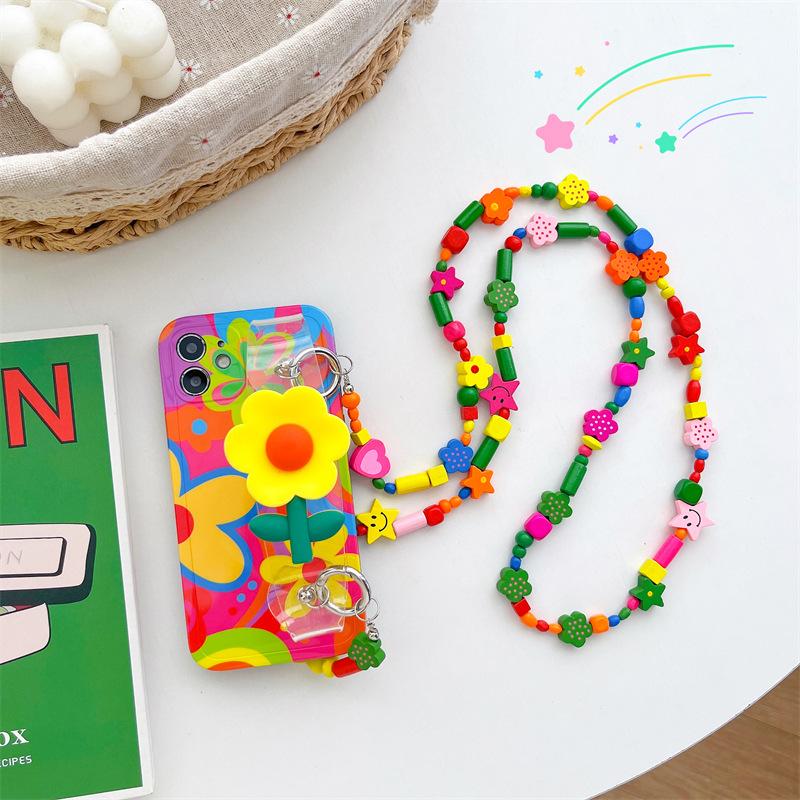 Smiley Face Wristband Bracket Is Suitable for Apple 16 Mobile Phone Case, Color Graffiti IPhone15 Messenger 14promax Soft Case.