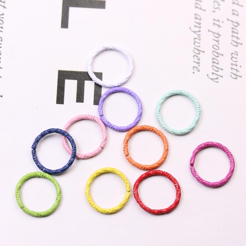 DIY Jewelry Accessories: Colored Baking Paint Embossed Rings (2,000/pack), featuring Round, Open, Single, and Twisted Flower Designs.