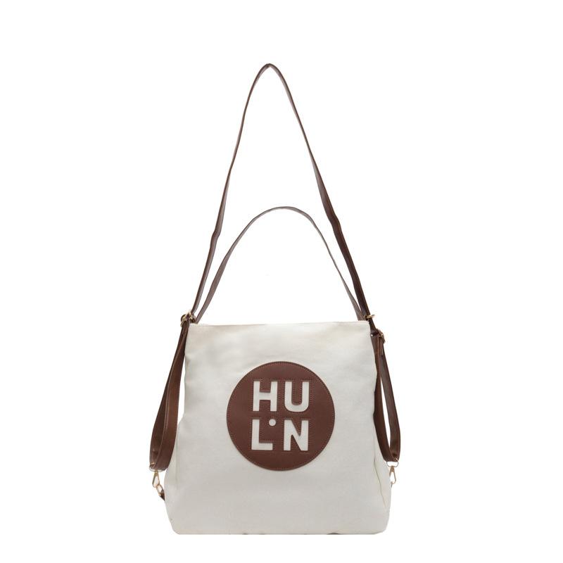 

Корейський друк літер багатоцільова тканинна кишеня 2024 нова текстура студентський рюкзак для поїздок на роботу на плечі