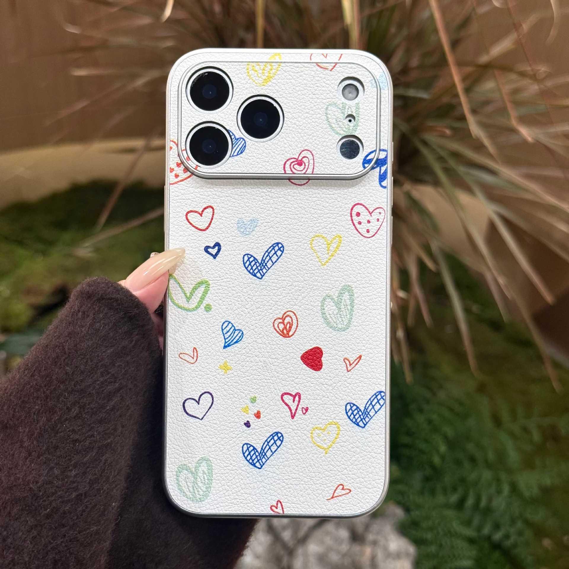 

Graffiti Heart iPhone Case: Compatible with iPhone 16, Apple 14 Promax, and New 17. Features Silver Edge, Leather Texture, and High-End Design. iPhone 13 Pro Max