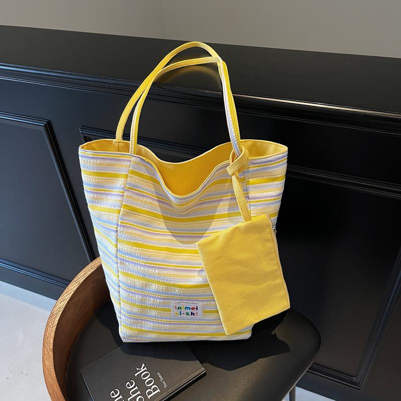 Korean version of casual large-capacity underarm bag women's 2025 new striped canvas bag double-sided back shoulder bucket bag