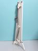 Wall-Mounted Black Metal Bedside Stand with Weighted White Base