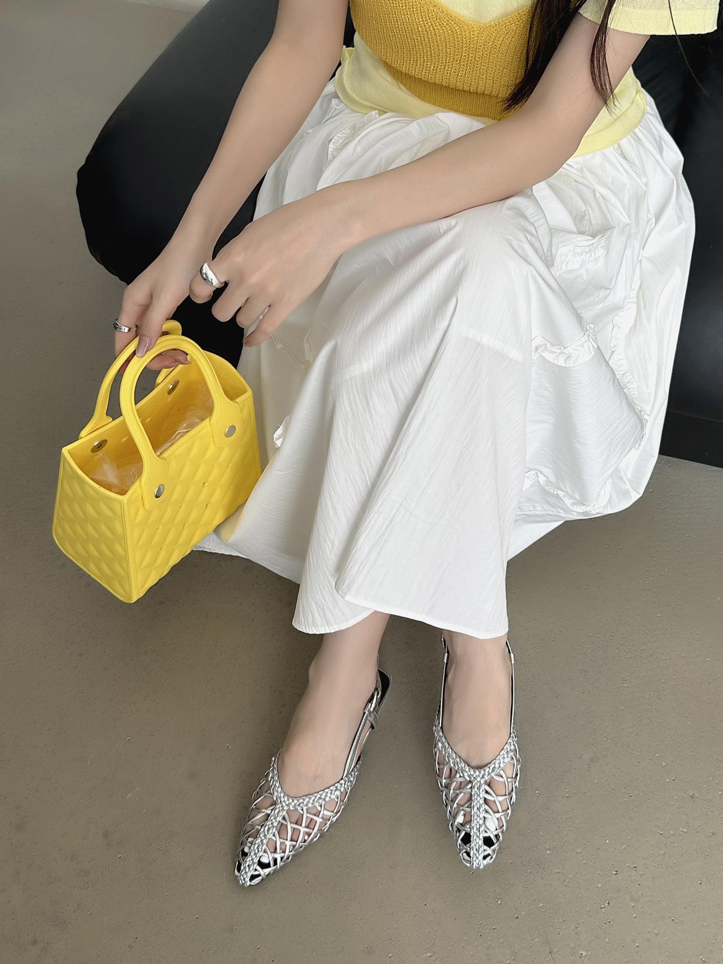 

Korean version of niche woven breathable sandals women s 2025 new holiday style flat bottom pointed hollow Muller sandals outside wear 39