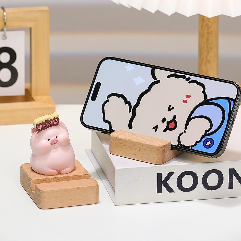 Mobile Phone Stand - Zhenan Zhenan, a Cute Resin Figurine for Home, Living Room, Tabletop Decoration. A Cute Pig-shaped Toy for Luxury Display.