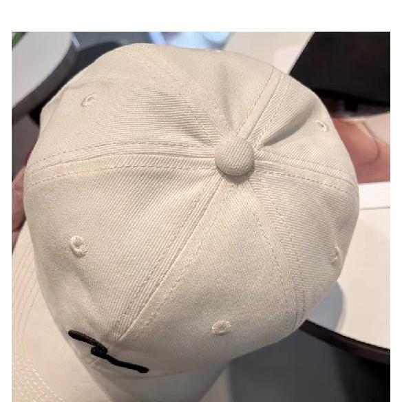 Embroidered baseball cap, lightweight and breathable for outdoor activities, designed to enhance facial features with a simple and stylish look