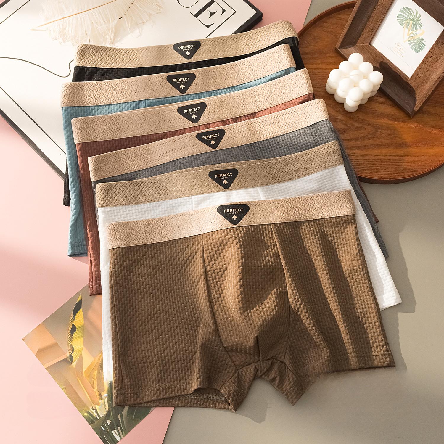 

Чоловіча білизна з крижаного шовку, Антибактеріальна ластовиця, Легка та з відчуттям прохолоди, Літня білизна з крижаного шовку, Чоловічі боксери L білий