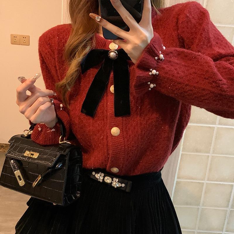New light ripe women's clothing bow trendy jacket knitted cardigan women's niche design sense gentle bright silk sweater