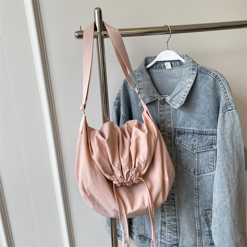 

Simple tote bag women s fashion drawstring shoulder bag Korean trend crossbody bag solid color versatile commuter bag 43*33*14 розовый
