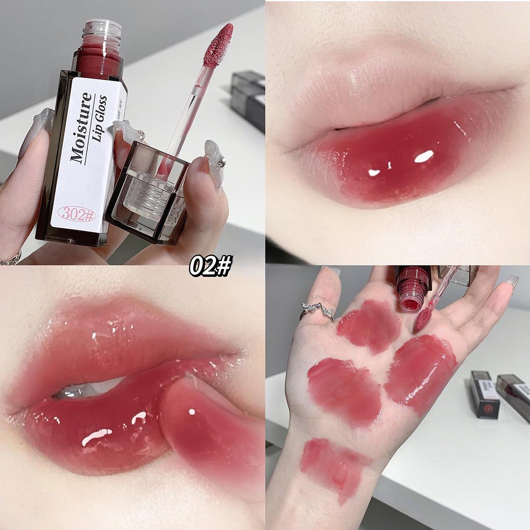 

Зволожуюча есенція для губ Медова зволожуюча водяниста дзеркальна глазур для губ Відбілює та стійкий макіяж Нелегко розмазує губну помаду