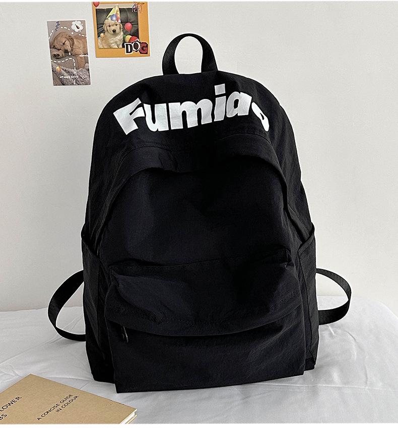 Lightweight Minimalist Backpack for Female Students: Versatile Double-Shoulder Bag for School and Travel.