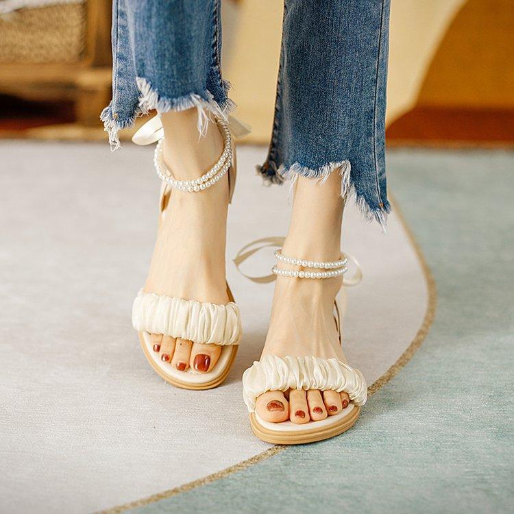 

Soft-soled sandals women s summer new versatile non-slip temperament with skirt one-word belt pearl women s shoes 35 абрикосовий
