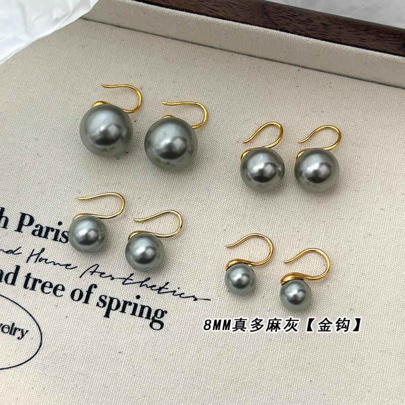 

Australian white glass pearl stud earrings women s French temperament fashion earrings silver needle commuting versatile high heels ear hook